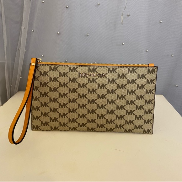 Michael Kors Handbags - Michael Kors Brown and Yellow Wristlet